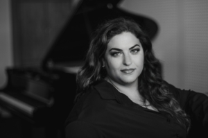 Opera illuminated by light at art commission concert