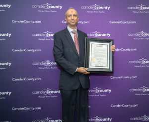 Doctor who finds ‘joy’ in service honored by county